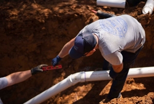 Plumber repairing sewer and drain in Knoxville